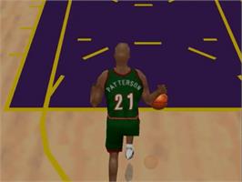 In game image of NBA Courtside 2 featuring Kobe Bryant on the Nintendo N64.
