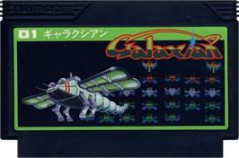 Cartridge artwork for Galaxian on the Nintendo NES.