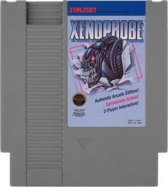 Cartridge artwork for Xenophobe on the Nintendo NES.