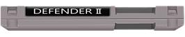 Top of cartridge artwork for Defender 2 on the Nintendo NES.