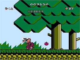 In game image of Adventure Island 3 on the Nintendo NES.