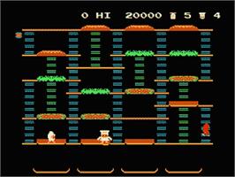 In game image of Burger Time on the Nintendo NES.