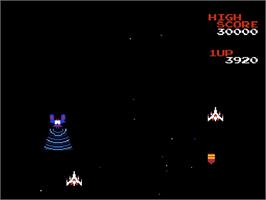 In game image of Galaga on the Nintendo NES.