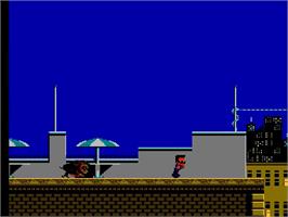 In game image of Hudson Hawk on the Nintendo NES.