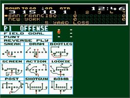 In game image of John Elway's Quarterback on the Nintendo NES.