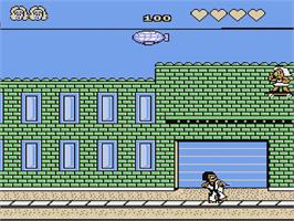In game image of L.a Cop - Miss. Peach World on the Nintendo NES.