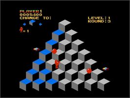 In game image of Q-bert on the Nintendo NES.