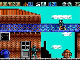In game image of Robocop 2 on the Nintendo NES.