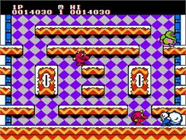 In game image of Snow Brothers on the Nintendo NES.