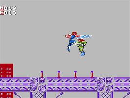 In game image of Strider on the Nintendo NES.
