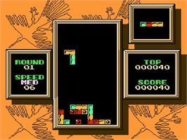 In game image of Tetris 2 on the Nintendo NES.