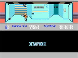 In game image of Xenophobe on the Nintendo NES.