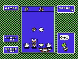 In game image of Yoshi's Cookie on the Nintendo NES.