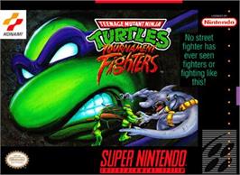 Box cover for Teenage Mutant Ninja Turtles - Tournament Fighters on the Nintendo SNES.