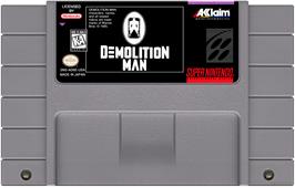 Cartridge artwork for Demolition Man on the Nintendo SNES.