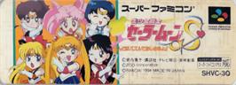 Top of cartridge artwork for Bishoujo Senshi Sailor Moon S: Kondo wa Puzzle de Oshioki yo on the Nintendo SNES.