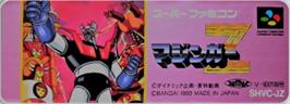 Top of cartridge artwork for Mazinger Z on the Nintendo SNES.