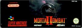 Top of cartridge artwork for Mortal Kombat 2 on the Nintendo SNES.