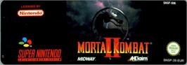 Top of cartridge artwork for Mortal Kombat II on the Nintendo SNES.