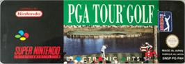 Top of cartridge artwork for PGA Tour Golf on the Nintendo SNES.