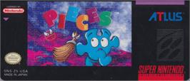 Top of cartridge artwork for Pieces on the Nintendo SNES.