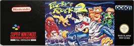 Top of cartridge artwork for Pocky & Rocky 2 on the Nintendo SNES.