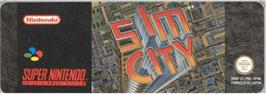 Top of cartridge artwork for SimCity on the Nintendo SNES.