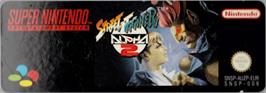 Top of cartridge artwork for Street Fighter Alpha 2 on the Nintendo SNES.