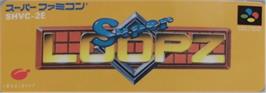 Top of cartridge artwork for Super Loopz on the Nintendo SNES.