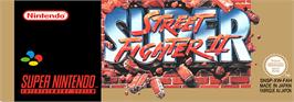 Top of cartridge artwork for Super Street Fighter 2 on the Nintendo SNES.