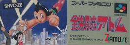 Top of cartridge artwork for Tetsuwan Atom on the Nintendo SNES.