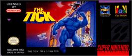 Top of cartridge artwork for The Tick on the Nintendo SNES.