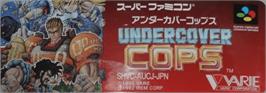 Top of cartridge artwork for Undercover Cops on the Nintendo SNES.