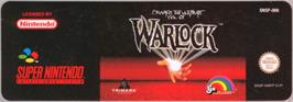 Top of cartridge artwork for Warlock on the Nintendo SNES.