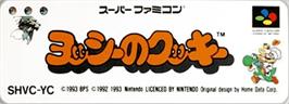 Top of cartridge artwork for Yoshi's Cookie on the Nintendo SNES.