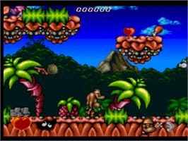 In game image of Chuck Rock on the Nintendo SNES.