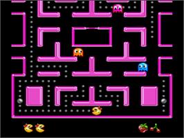In game image of Ms. Pac-man on the Nintendo SNES.
