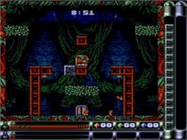In game image of Troddlers on the Nintendo SNES.