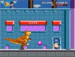 In game image of We're Back! - A Dinosaur's Story on the Nintendo SNES.