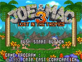 Title screen of Joe & Mac 2: Lost in the Tropics on the Nintendo SNES.