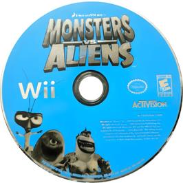 Cartridge artwork for Monstres Contre Aliens on the Nintendo Wii.