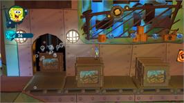 In game image of Bob L'eponge Et Ses Amis - Contre Les Robots-jouets on the Nintendo Wii.