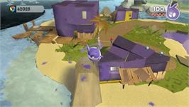 In game image of De Blob 2 on the Nintendo Wii.
