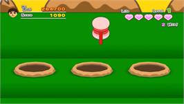 In game image of Happy Hammerin' on the Nintendo Wii.