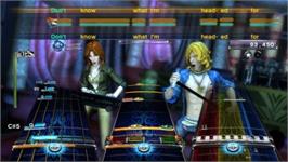 In game image of Rock Band 3 on the Nintendo Wii.