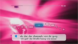 In game image of We Sing Deutsche Hits on the Nintendo Wii.