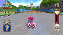 In game image of Yatterman Wii : Bikkuri Dokkiri Machine de Mou Race da Koron on the Nintendo Wii.