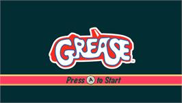 Title screen of Grease - Le Jeu Vidéo Officiel on the Nintendo Wii.