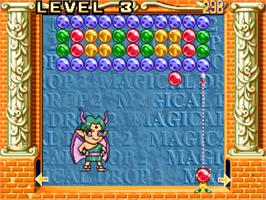 In game image of Magical Drop II on the SNK Neo-Geo CD.