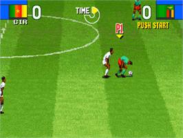 In game image of Super Sidekicks 2 - The World Championship on the SNK Neo-Geo CD.